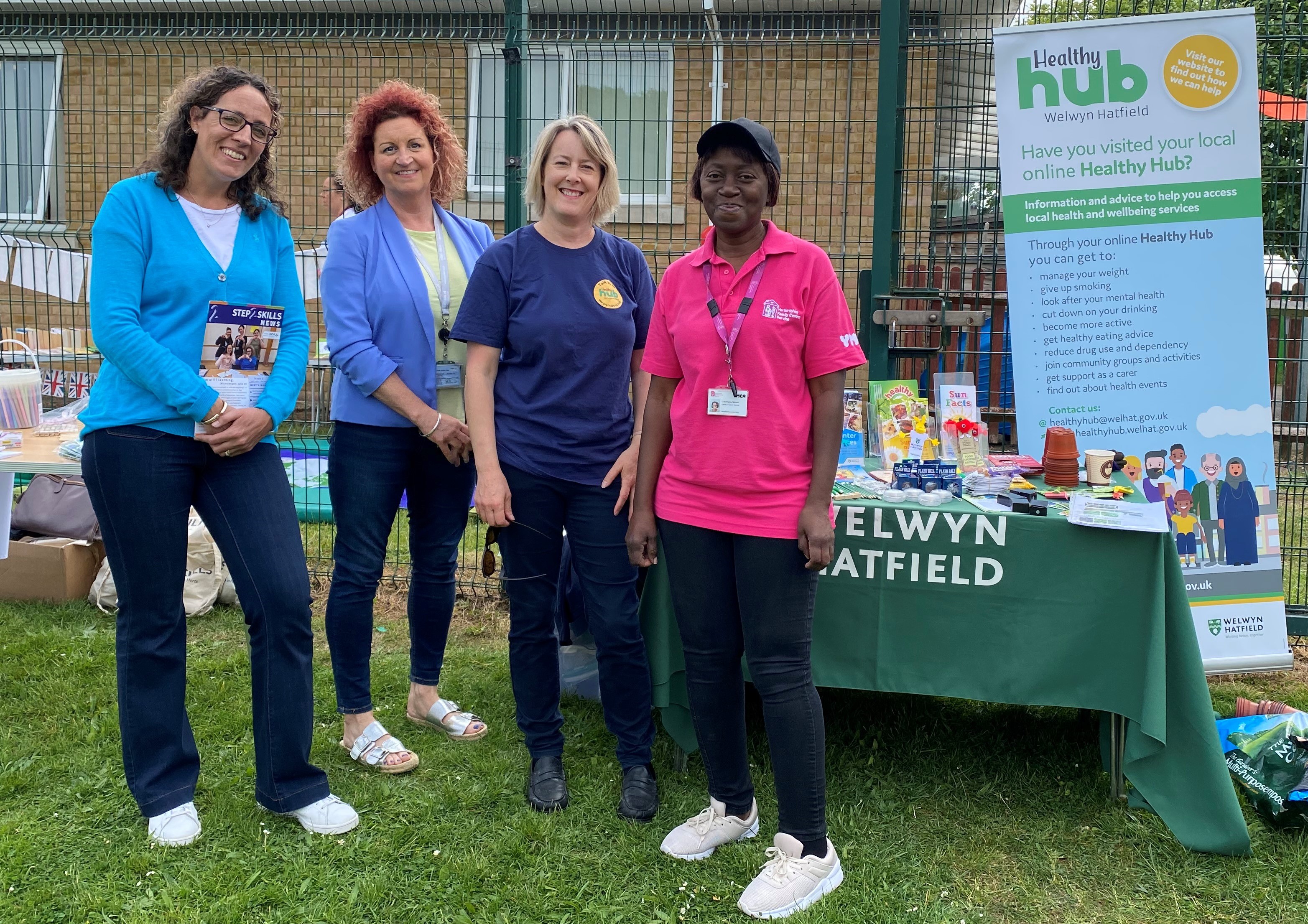 Group of ladies at a healthy hub stand