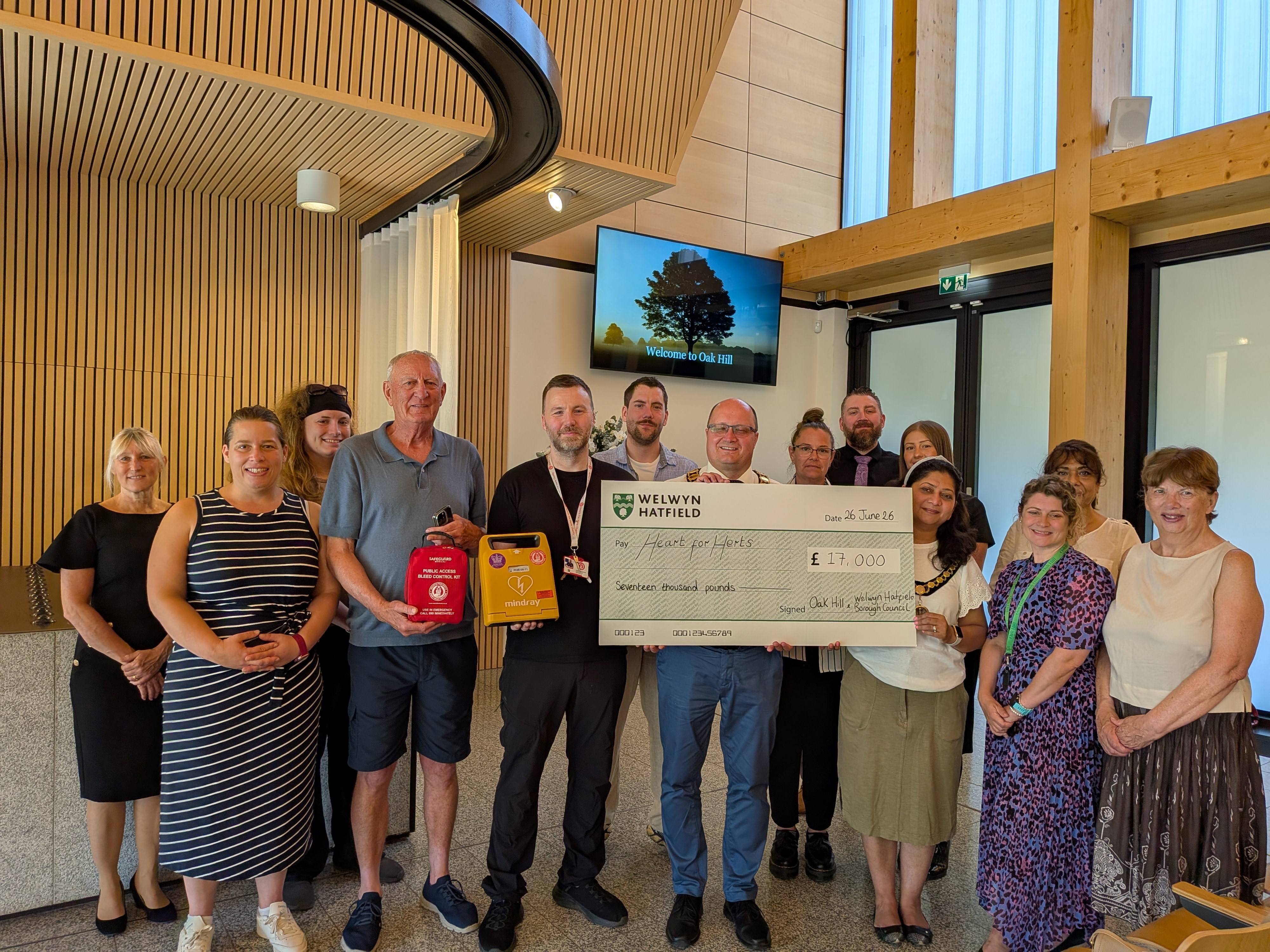 Oak Hill Charity cheque to Hearts to Herts