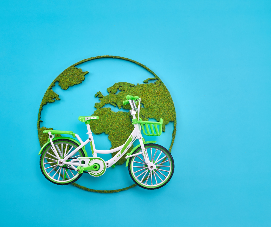 sustainable travel image. bicycle in front of globe