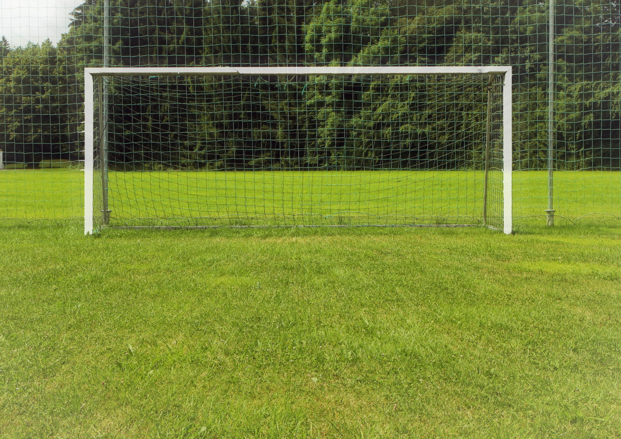 Football goal in a field.