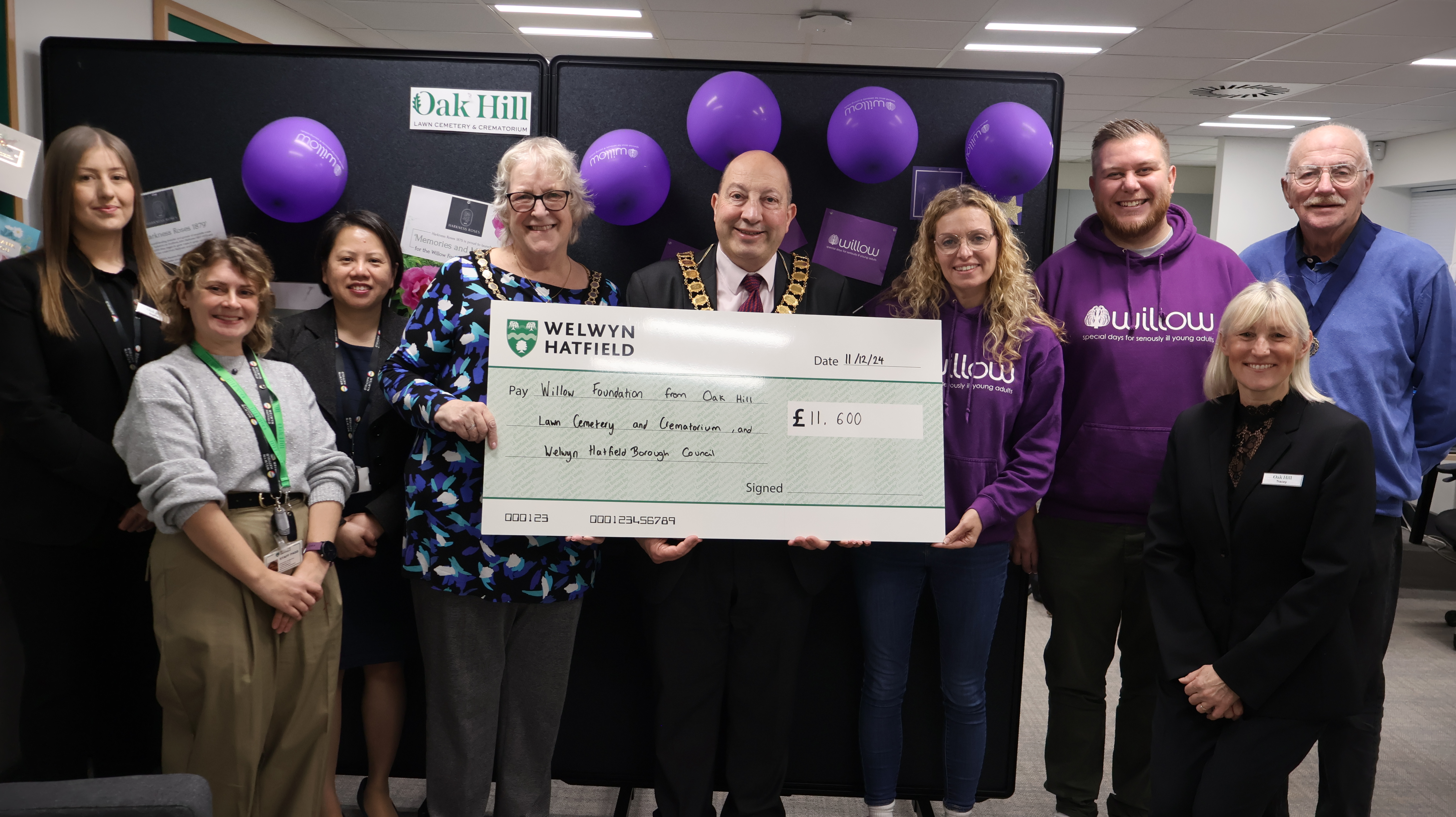 Mayor of Welwyn Hatfield Borough Council, Frank Marsh, presenting the cheque