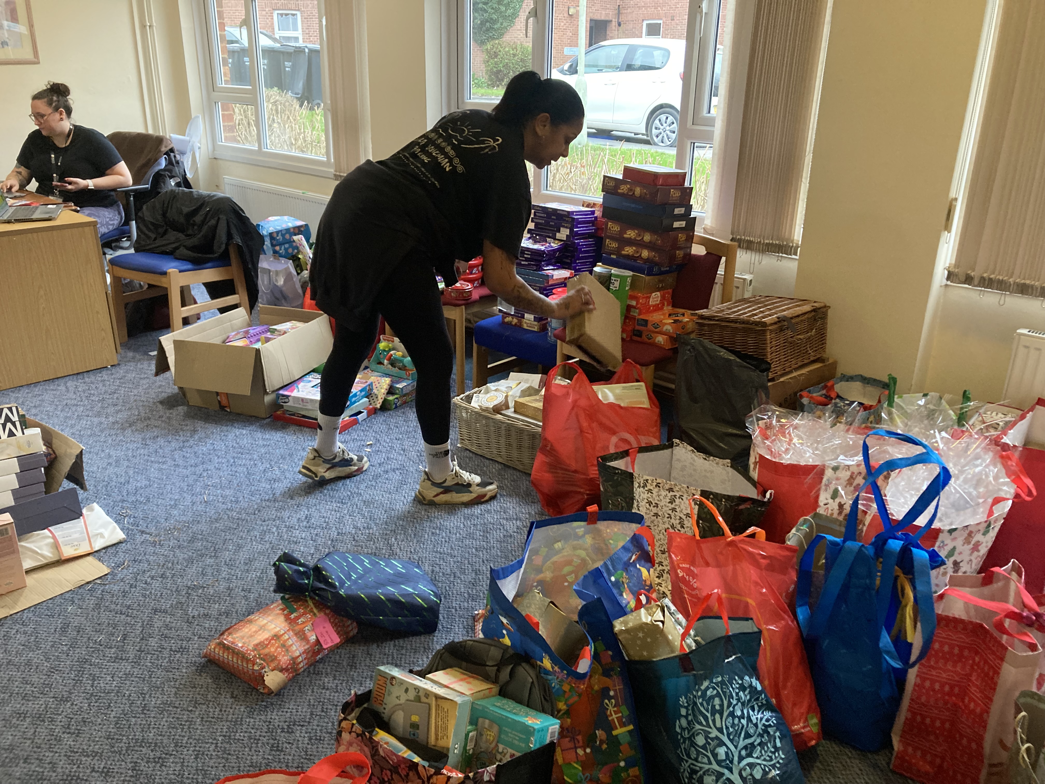 Person sorting gifts