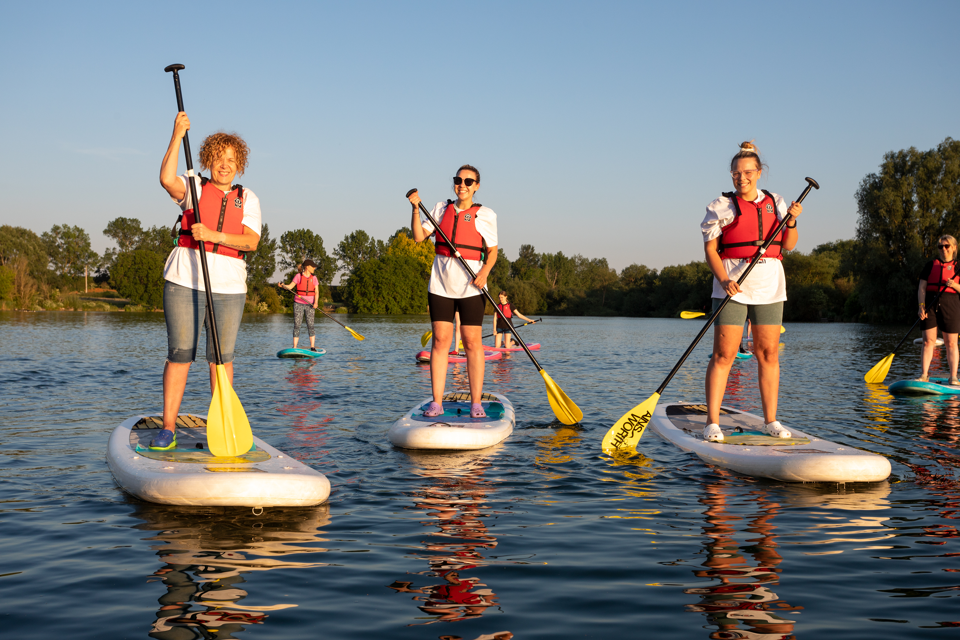 Women standing up on paddleboard