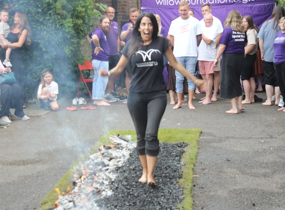 Lady walking on coals