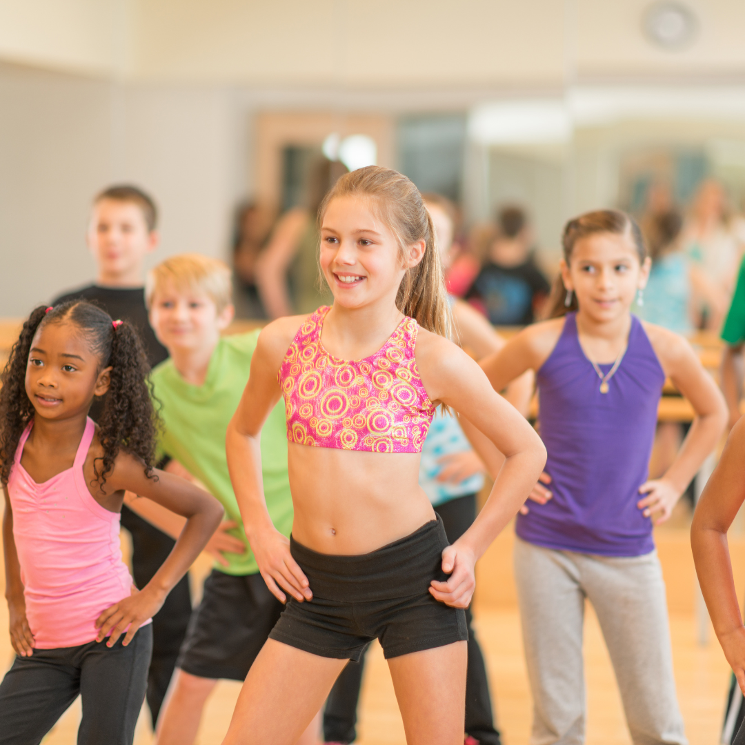 A group of young girls at a jazz class