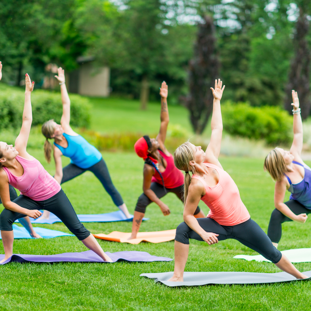 A group of women going yoga outside
