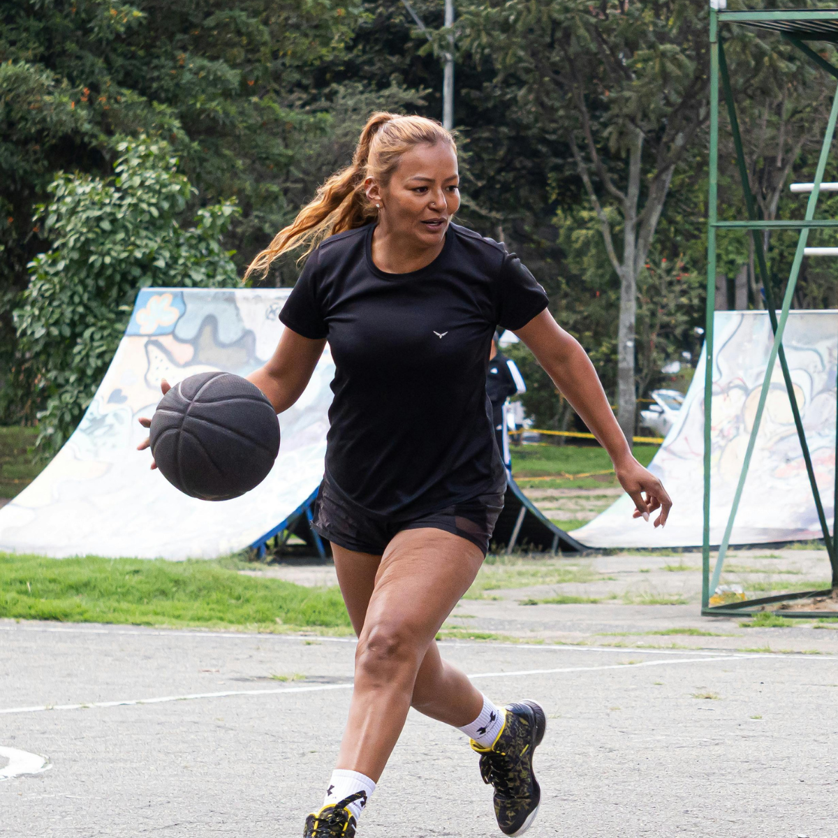 Woman playing basketball