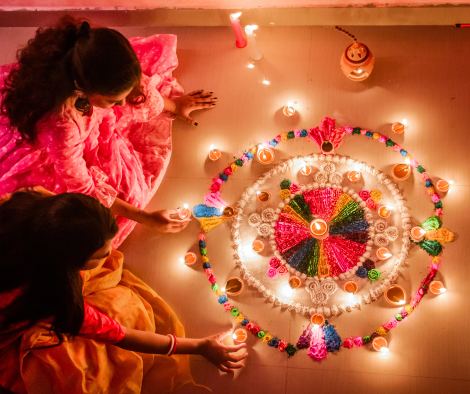 two ladies arranging candles and flowers