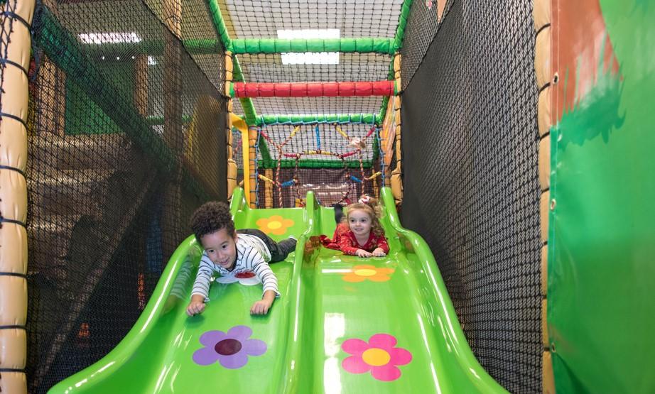 Kids going down a slide