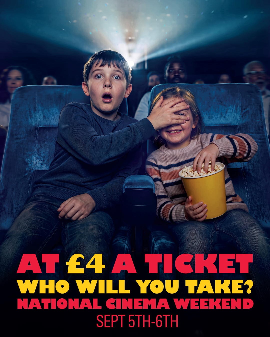 Two children in cinema seats